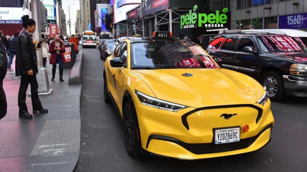 1640255614 gravity ford mustang mach e nyc yellow taxi exterior