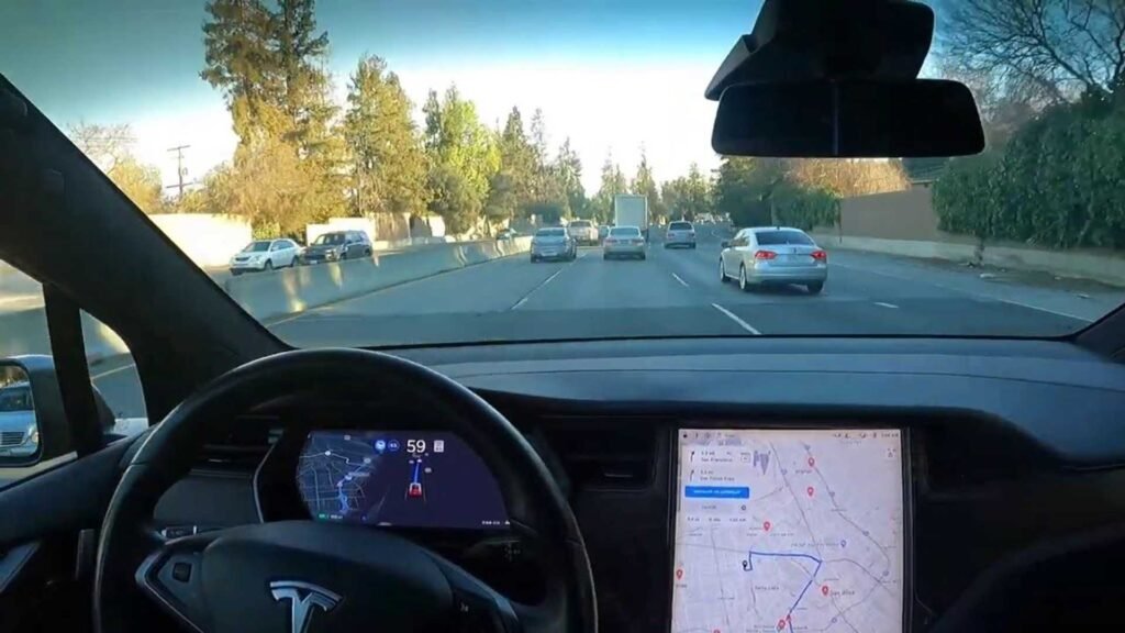 tesla full self driving to service center